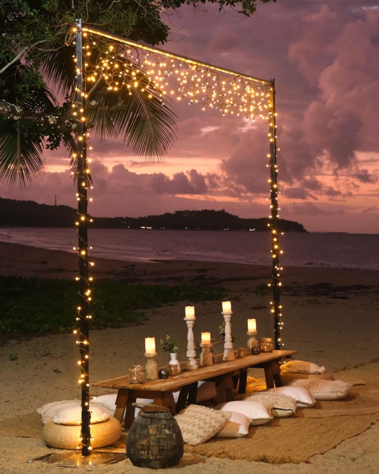 Melaleuca Resort - Palm cove weddings - beautiful beach picnic set up on the beach with fairy lights